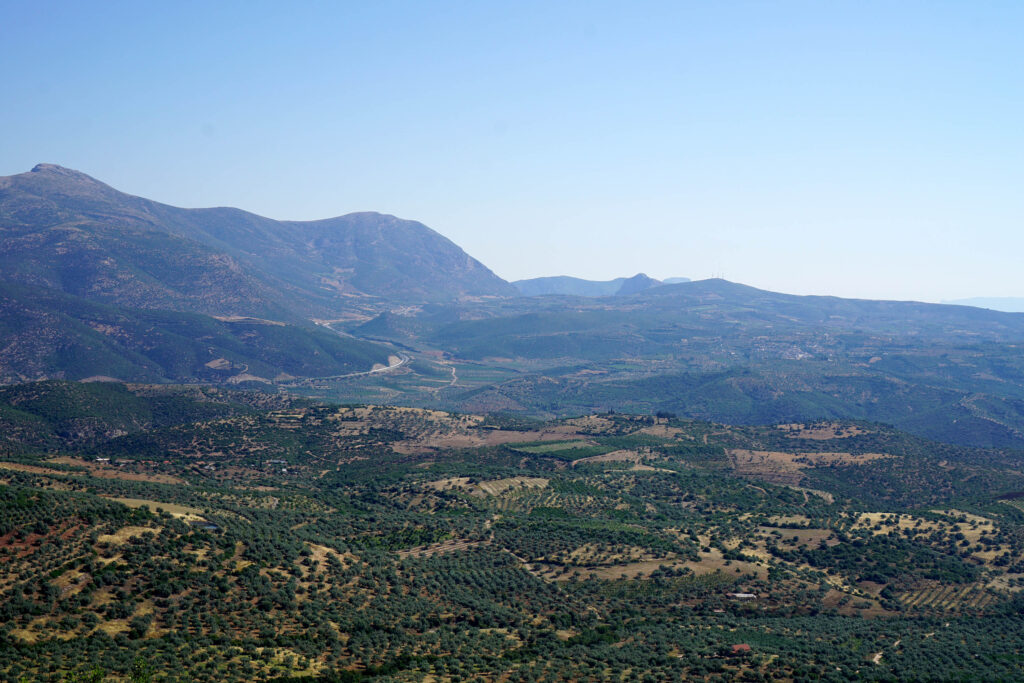 The western Argolid, from the heights above Schinochori looking north towards Malandreni and Megalovouni. The winding route of the Moreas motorway is visible in the mid-distance.